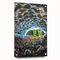 Acrylic glass artwork showcasing a vibrant landscape with dramatic caves, viewed from the side and secured with pins, ideal for modern home decor.