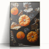 Mid-century modernist art depicting abstract autumn leaves in warm orange and brown tones, framed in silver acrylic.