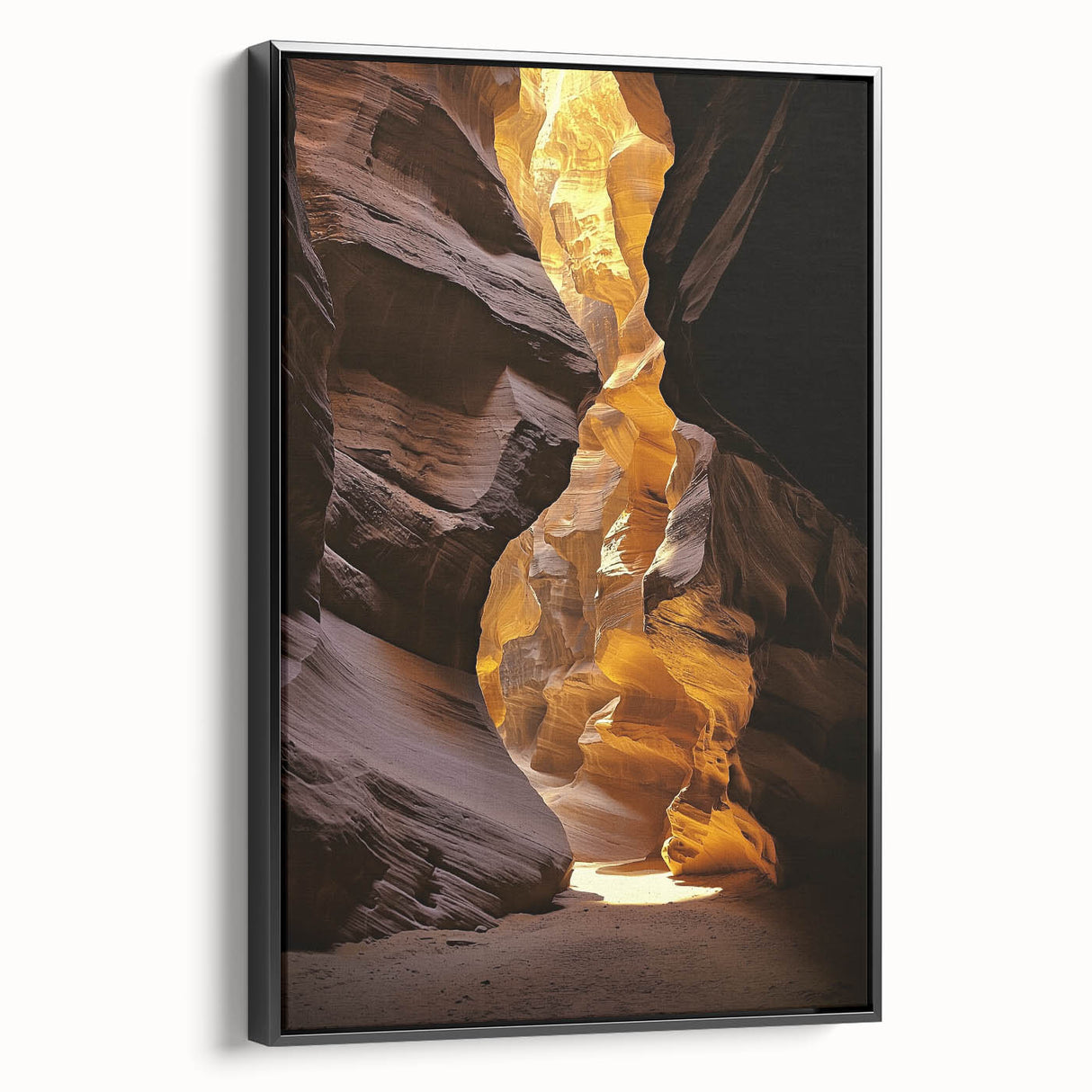 Framed canvas artwork showcasing a striking landscape scene with caves, featuring a sleek black frame. Perfect for enhancing modern home decor.