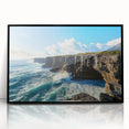 Framed acrylic artwork depicting a stunning landscape of cliffs against a vibrant sky, featuring a sleek black frame that enhances the overall aesthetic. Perfect for modern home decor.