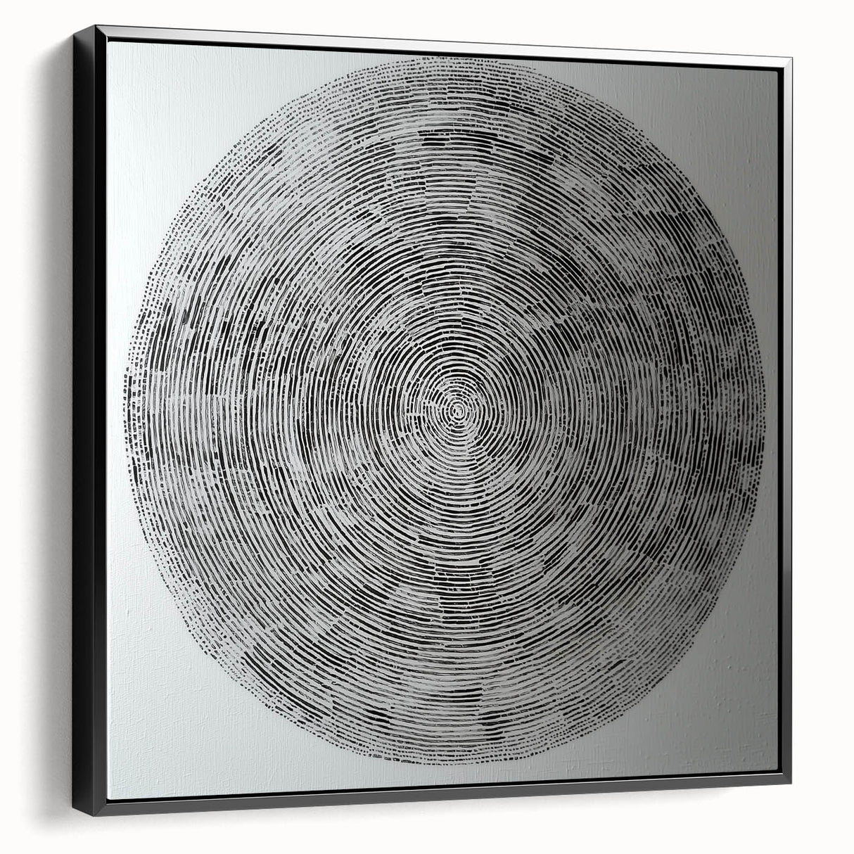 Abstract geometric framed canvas artwork showcasing a modern black and white design, perfect for contemporary home decor. The side view highlights its sleek frame and textured details, ideal for enhancing artistic spaces.