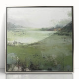 Framed abstract landscape wall art in a sleek silver frame, showcasing vibrant colors and dynamic shapes, perfect for modern home décor and artistic flair.