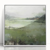 Framed abstract landscape wall art featuring soothing blue and green hues, presented in a sleek white frame, perfect for modern home decor.