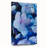 Large abstract wall art depicting spring season in vibrant green and pink tones on acrylic glass.