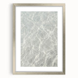 Abstract textured art print in muted gray and silver tones on a framed canvas, suitable for bedroom decor.