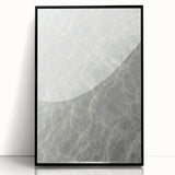 Large abstract wall art featuring swirling blue and green colors on a black acrylic frame.
