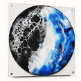Abstract geometric acrylic glass art piece showcasing vibrant colors and intricate patterns, displayed in a modern setting with unique pin supports for stability.