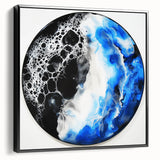 Abstract geometric framed canvas artwork in black, showcasing a modern design with sharp lines and shapes, ideal for contemporary home decor.