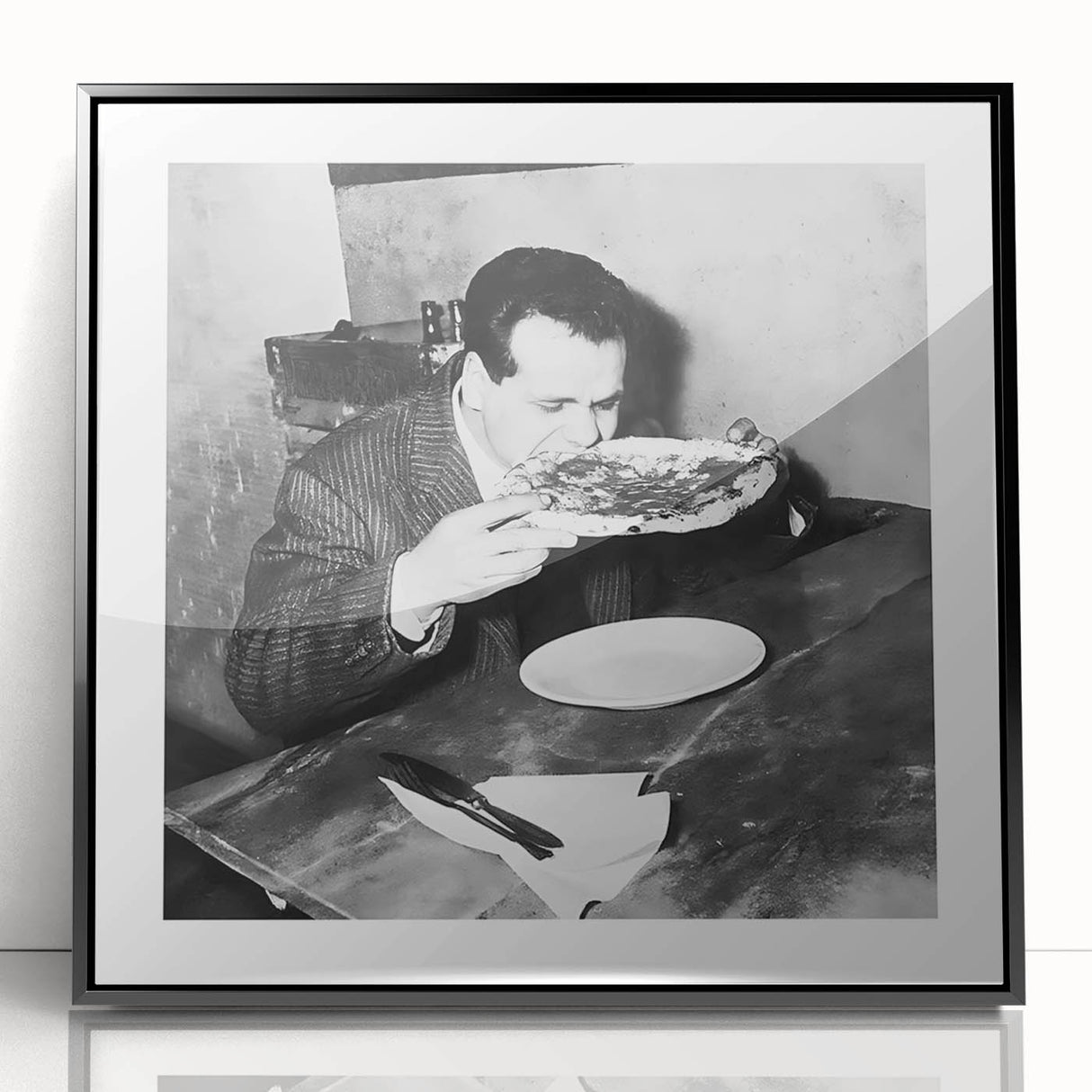 Large abstract wall art featuring mid-century modernist design in black and white tones, framed in acrylic.