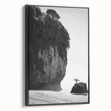 Framed landscape canvas art showcasing a serene black and white mountain scene, featuring a sleek black frame and ideal for modern home decor.