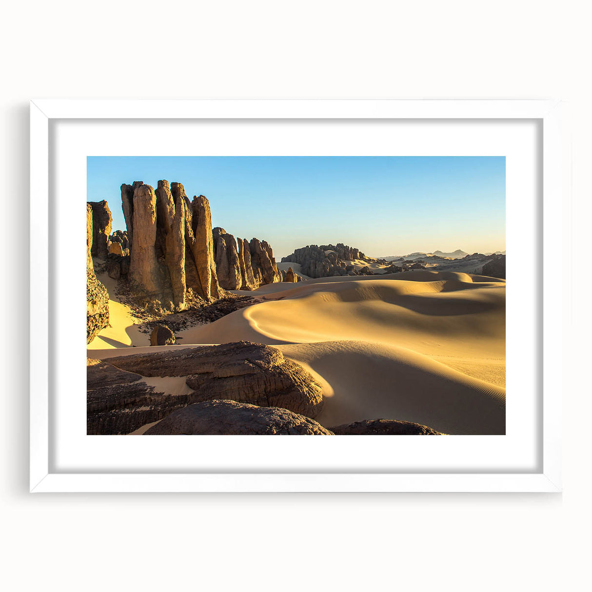 Extra large abstract art print featuring textured scenery of Algeria in muted earth tones, framed with a white mat.