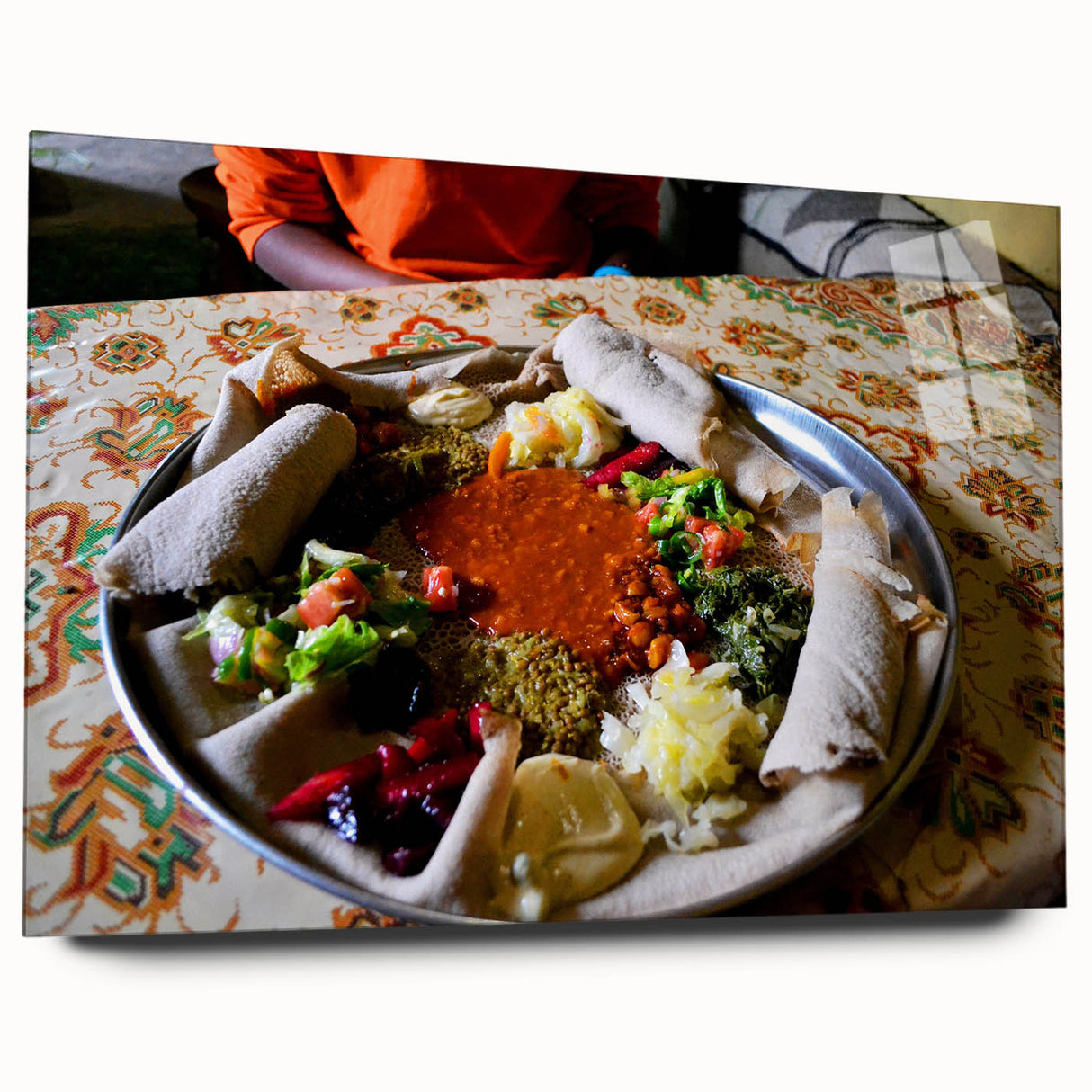 Large abstract wall art of Ethiopian scenery in vibrant earth tones on acrylic glass, ideal for bedroom or dining room decor.