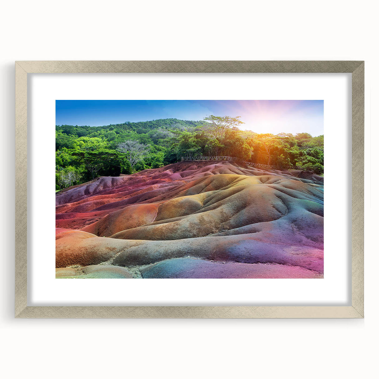 Abstract art print of a Mauritian landscape in muted blues and greens, framed in silver, suitable for dining room decor.