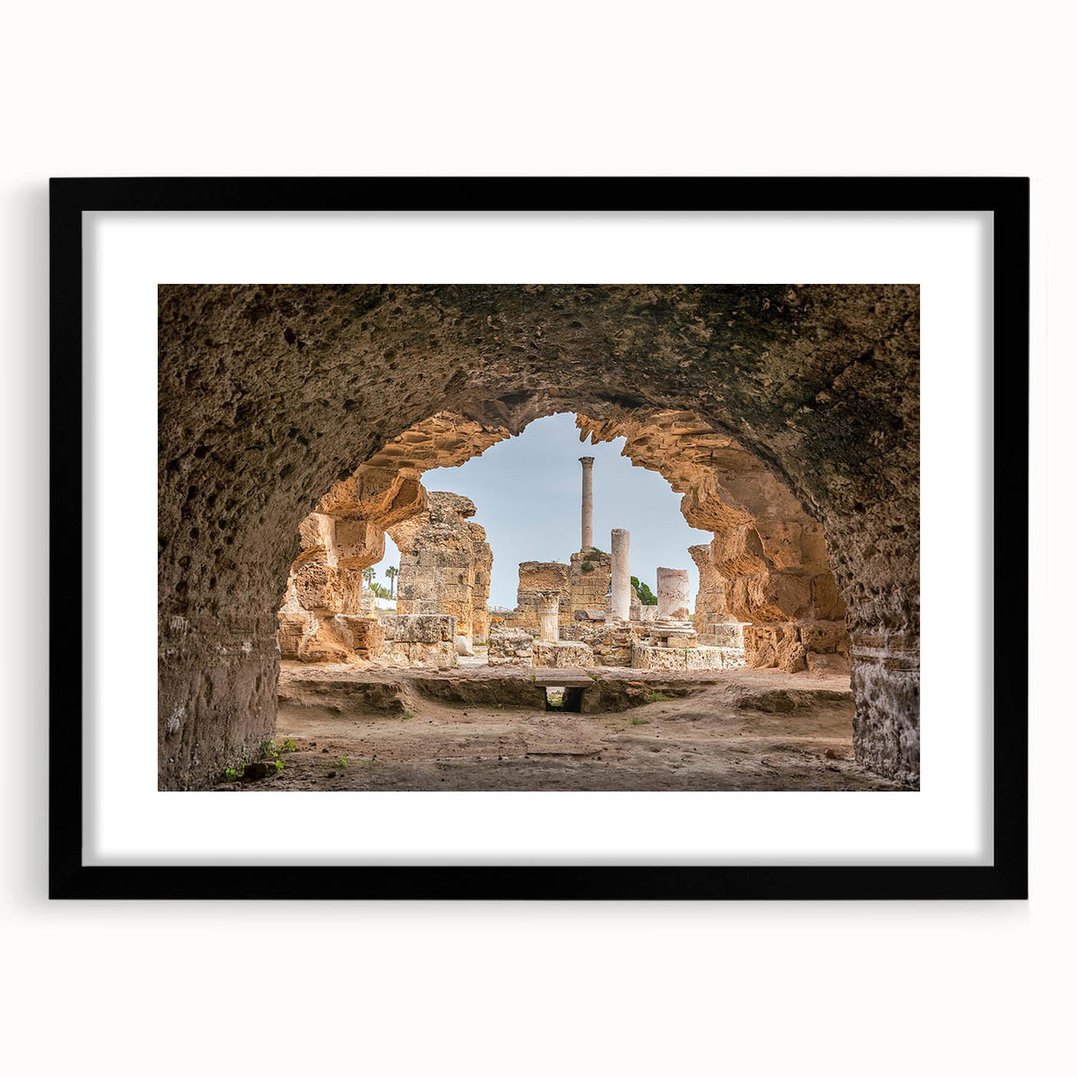 Extra large abstract art print of a colorful Tunisian landscape, textured on a black framed canvas.