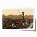 Extra large rolled print of a Cambodian landscape with lush greenery and temples, in muted earth tones.