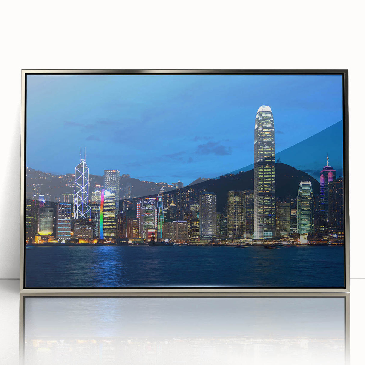 Mid-century modernist art depicting Hong Kong skyline in muted silver tones on a framed acrylic.