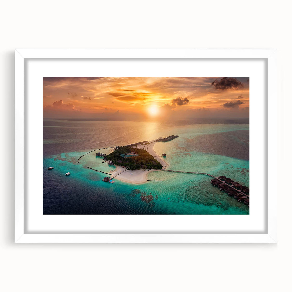 Abstract art print of Maldivian scenery in muted blue and green tones on a framed white mat, ideal for dining room decor.