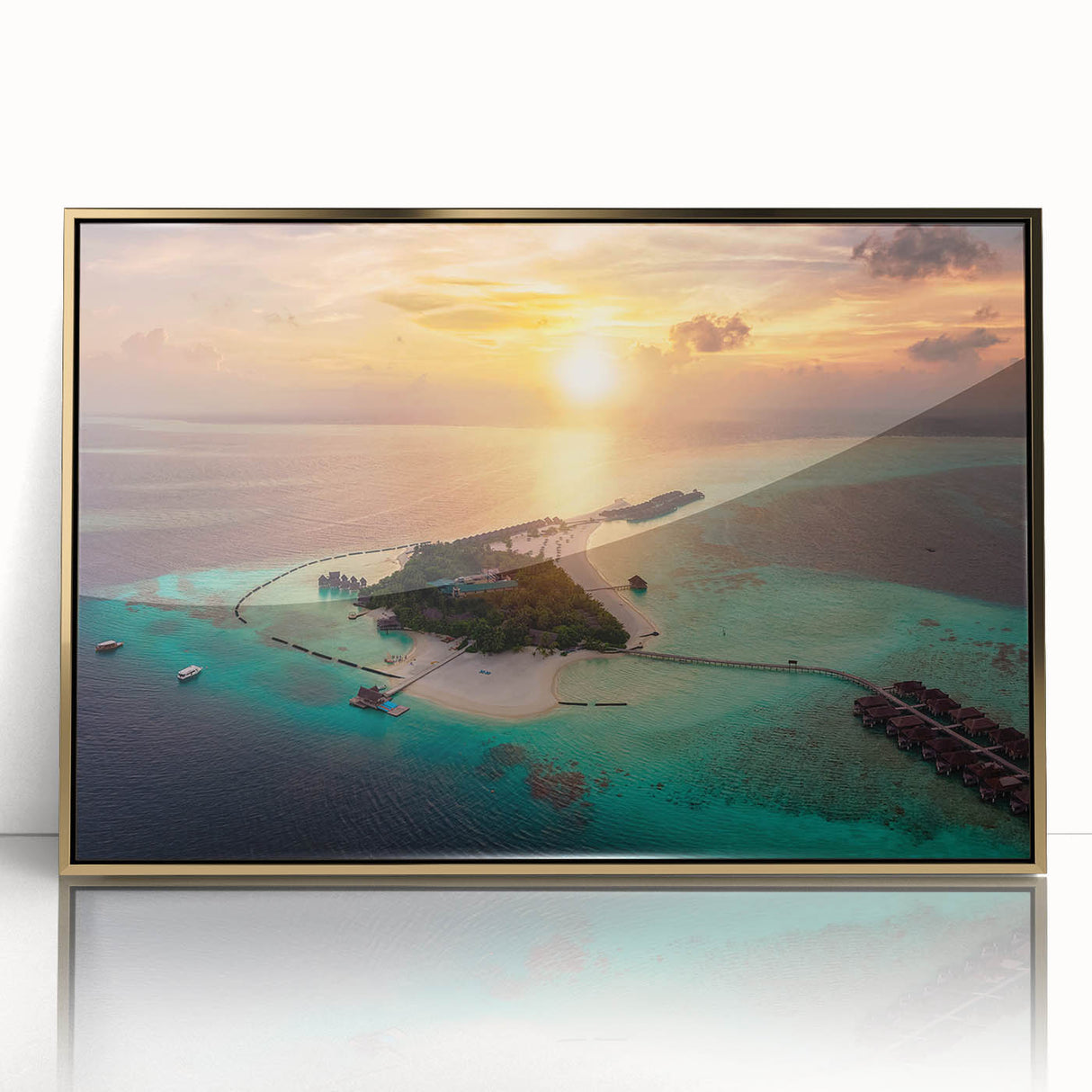 Acrylic print of a serene Maldivian landscape in soft blue and green shades, framed in gold.