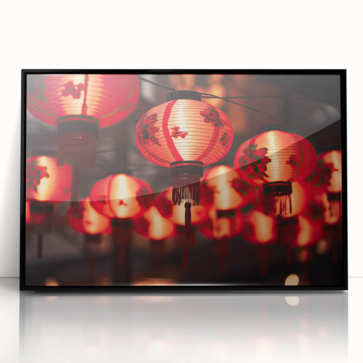 Framed acrylic print of a large abstract depiction of Singapore, with bold black and red tones.
