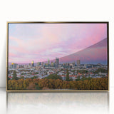 Mid-century modernist art depicting Brisbane skyline in gold and black hues on a framed acrylic.