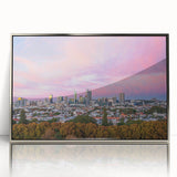 Acrylic print of Brisbane skyline in art deco style with silver frame, ideal for modern nursery wall art.