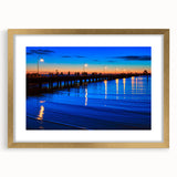 Textured abstract art print of Melbourne scenery in muted gold and brown tones, framed with a gold mat.