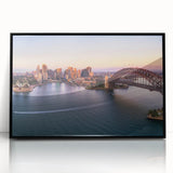 Large abstract wall art depicting Sydney's skyline in muted gray and blue tones on a black framed acrylic.