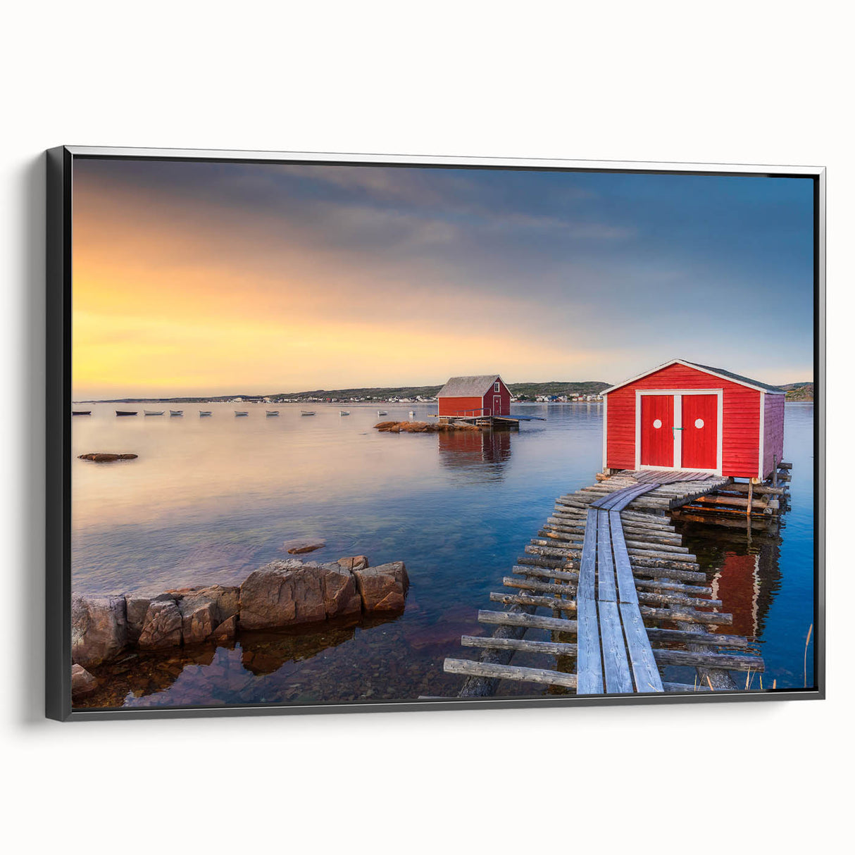 Black and white wall art featuring a vintage poster art style landscape of Newfoundland on framed canvas.
