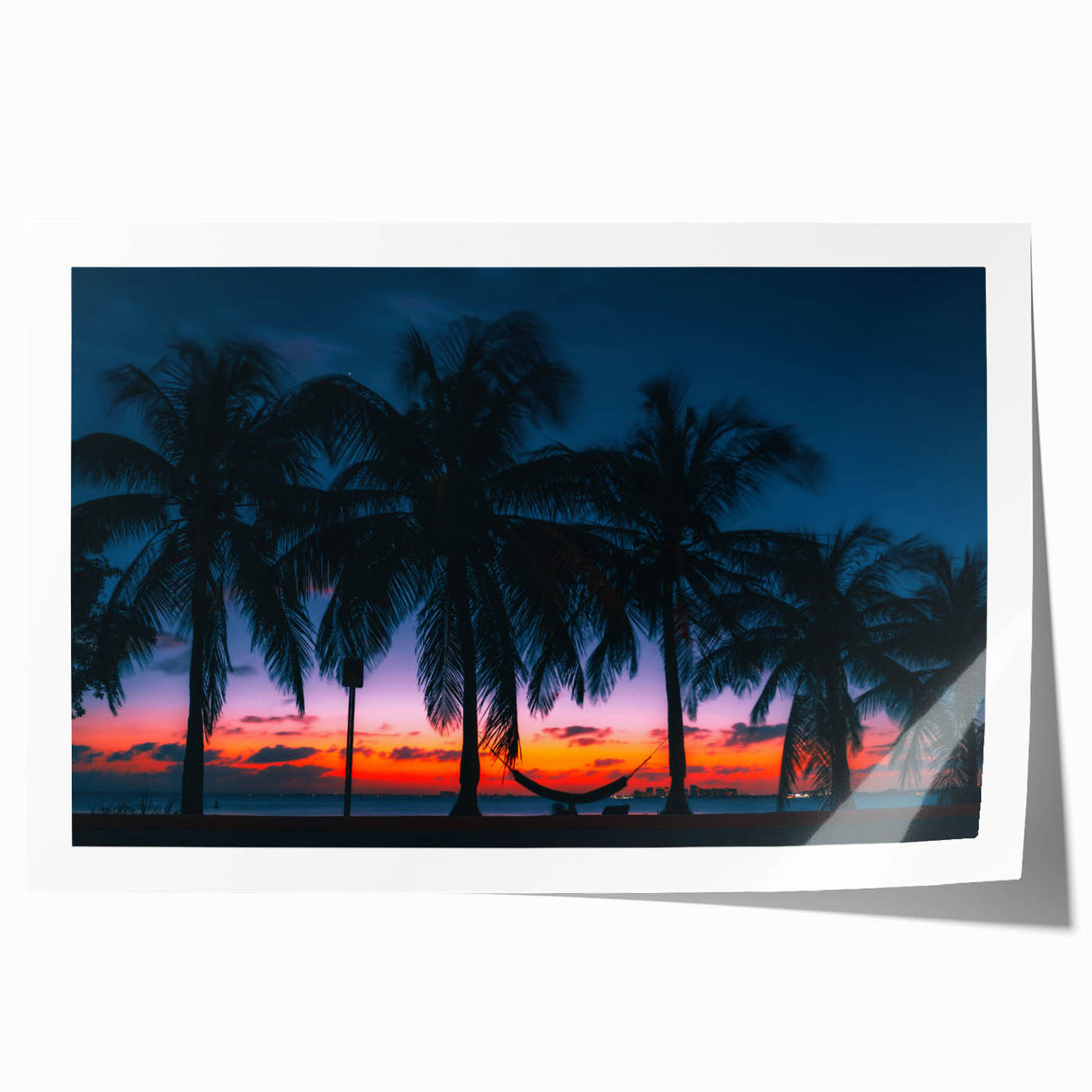 Caribbean coastal scene with vibrant blues and greens on a rolled canvas, suitable for dining room or bathroom décor.
