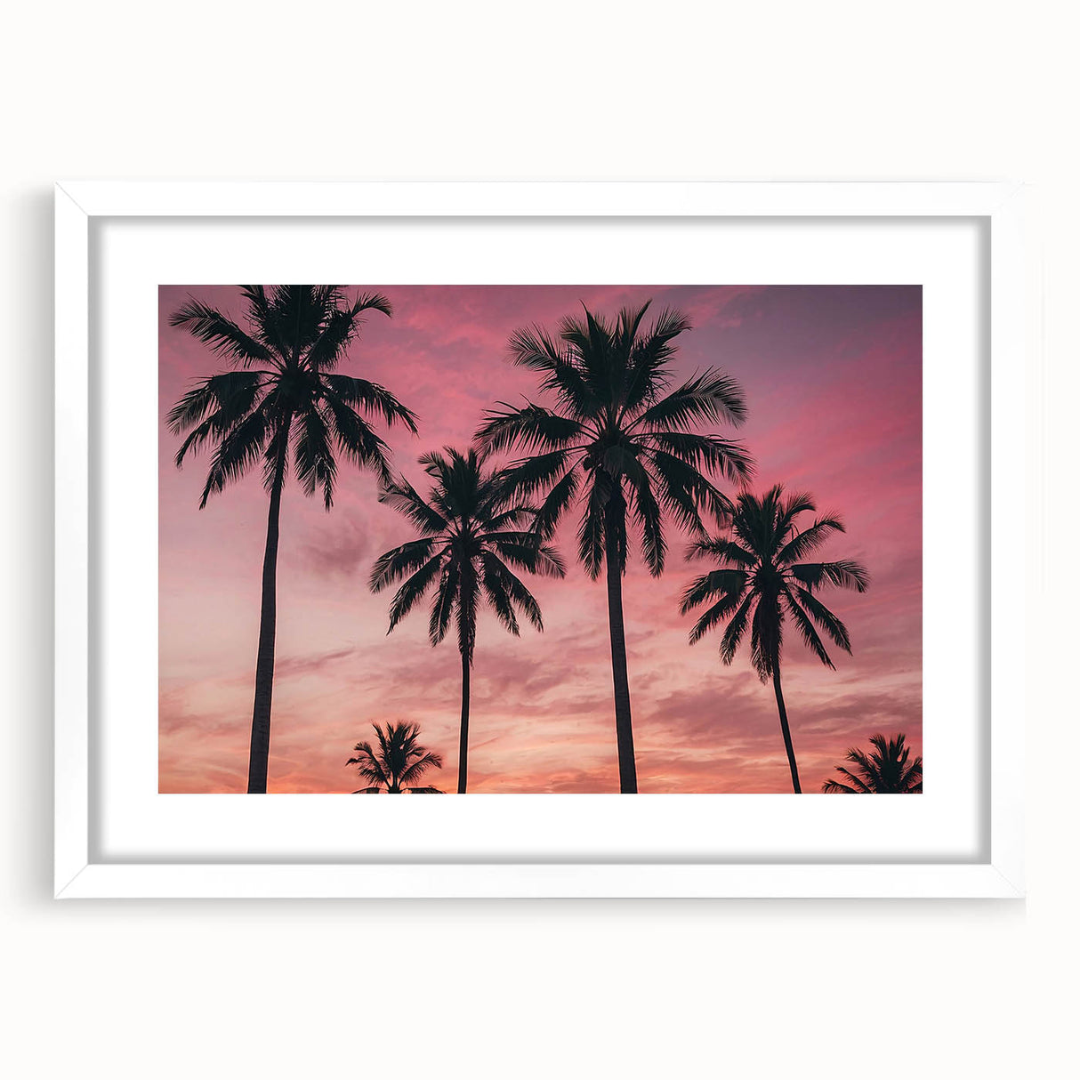 Textured abstract art print depicting Caribbean scenery in vibrant blue and green hues, framed with a white mat.
