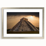 Textured abstract art print depicting a Central American scenery in muted earth tones, framed in silver.