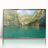 Mid-century modernist acrylic print of a serene Albanian landscape in cool blue and green tones, framed in silver.