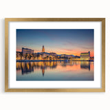 Abstract art print of a Croatian landscape in muted earth tones on a framed canvas, suitable for dining room decor.