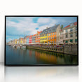 Large abstract wall art depicting a European Denmark scenery in muted gray and blue tones, framed in black acrylic.