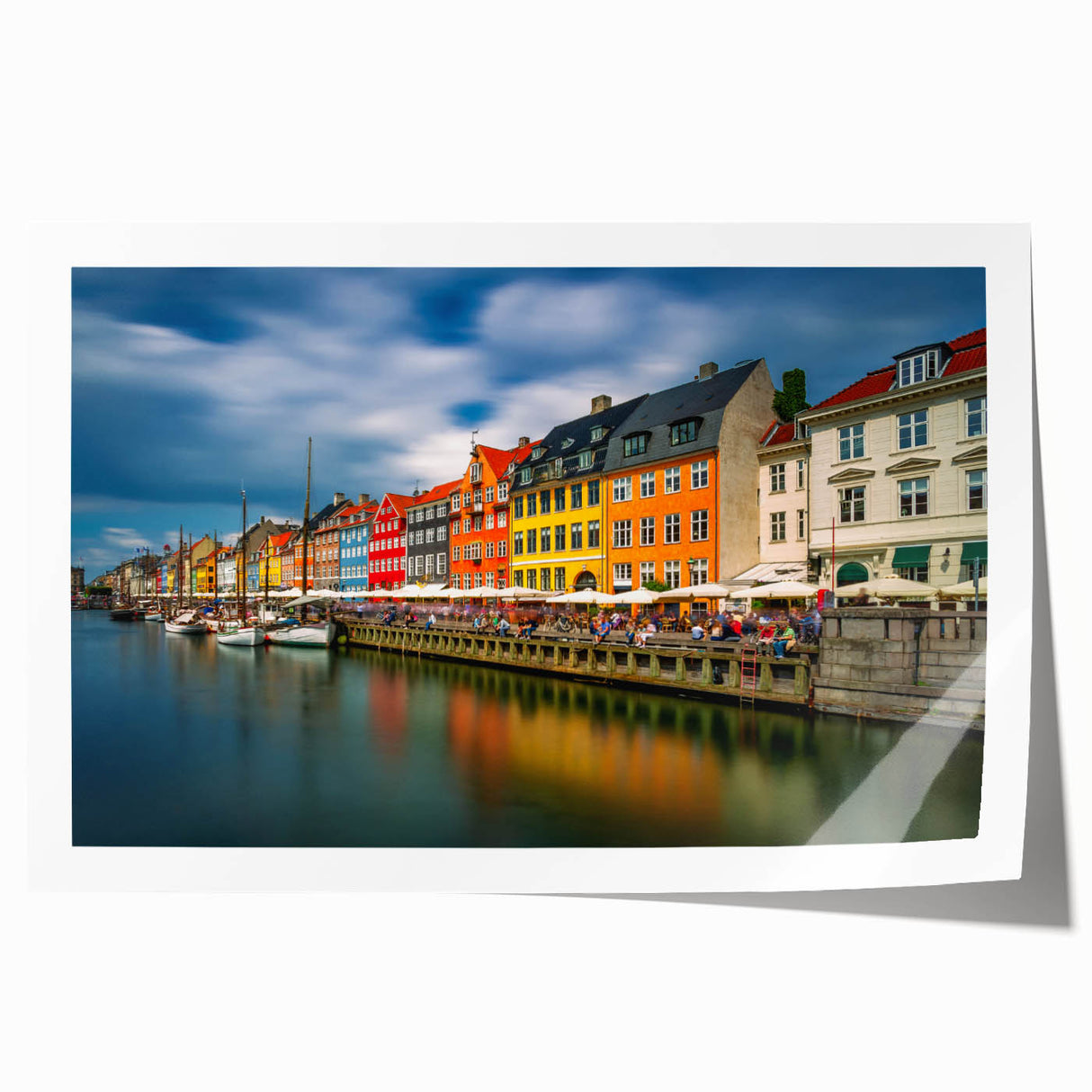 Rolled print of a serene Danish landscape with soft pastel shades.