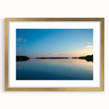 Abstract art print of a European scenery in muted earth tones, framed in gold, suitable for dining room decor.