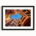 Extra large abstract art print of Lyon scenery in colorful, textured style on a black framed canvas.
