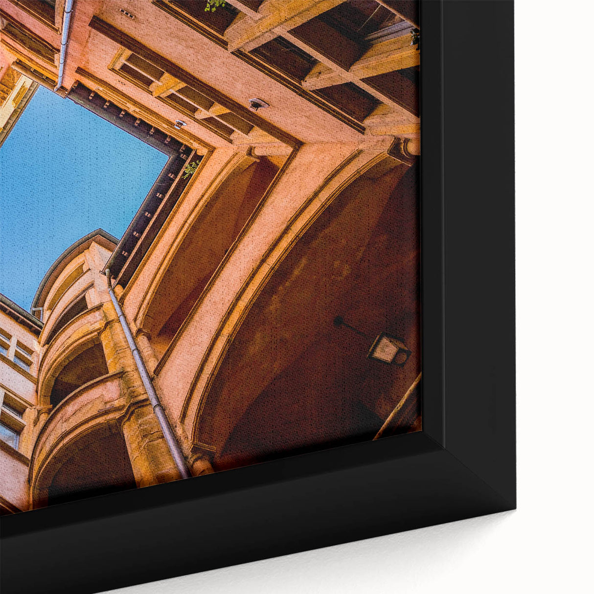 Extra large black wall art featuring a textured, colorful depiction of Lyon, France on a framed canvas.