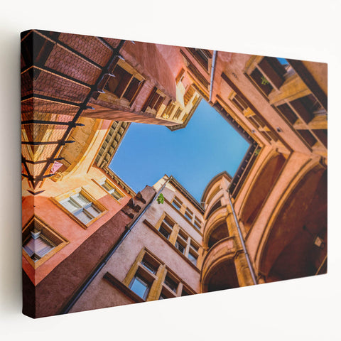 Side view of a stretched canvas featuring a detailed Lyon scenery in natural and earthy tones, suitable for kitchen wall art.