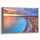 Framed canvas featuring a vintage-style landscape painting of Nice, France in muted gold and black tones.