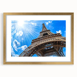 Abstract art print of Paris scenery in muted gold tones on a framed canvas, suitable for dining room decor.