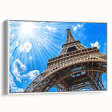 Vintage poster art of Paris with vibrant, colorful accents on white framed canvas, ideal for living room decor.