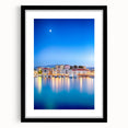 Extra large abstract art print of a vibrant, colorful European seaside scene on a textured canvas, framed in black.