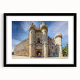Colorful abstract art print of European scenery on textured canvas, framed in black, suitable for large living room walls.