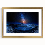 Abstract art print of a European Iceland scenery in muted blue and gray tones, framed in gold.