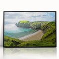 Large abstract wall art depicting a serene Irish landscape in muted green and blue tones, framed in black acrylic.