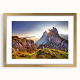 Abstract art print of the Dolomites in Italy, using soft blue and green tones, framed in gold, ideal for dining room decor.