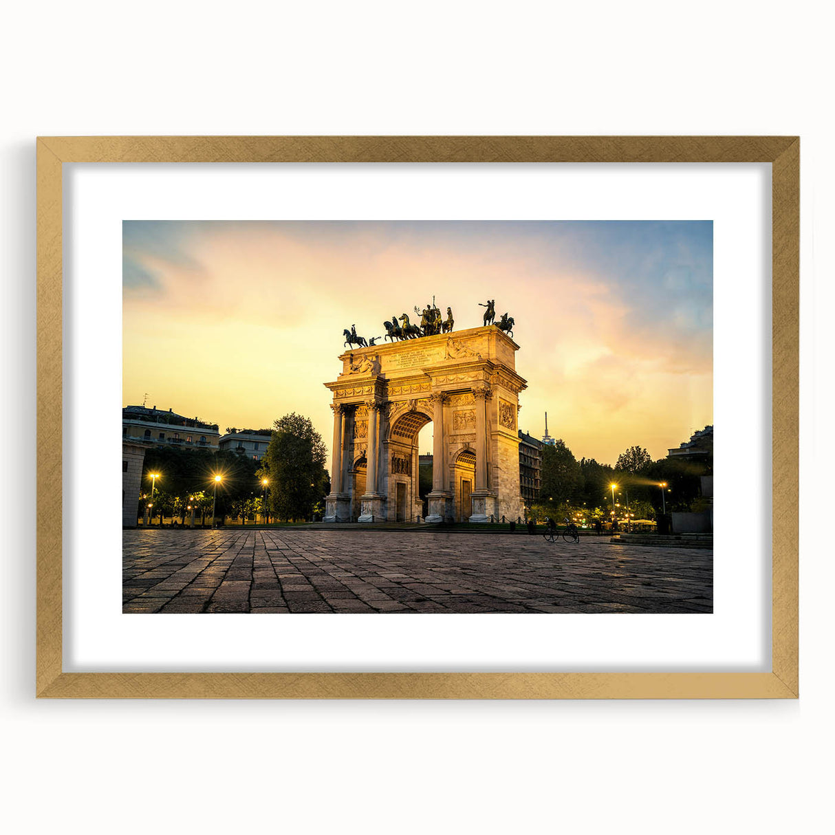 Abstract art print of Milan scenery in muted gold and beige tones, framed with a gold mat, suitable for dining room decor.