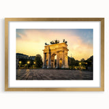 Abstract art print of Milan scenery in muted gold and beige tones, framed with a gold mat, suitable for dining room decor.