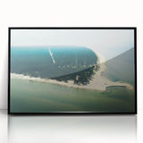 Large abstract wall art depicting a European cityscape in muted gray and blue tones, framed in black acrylic.